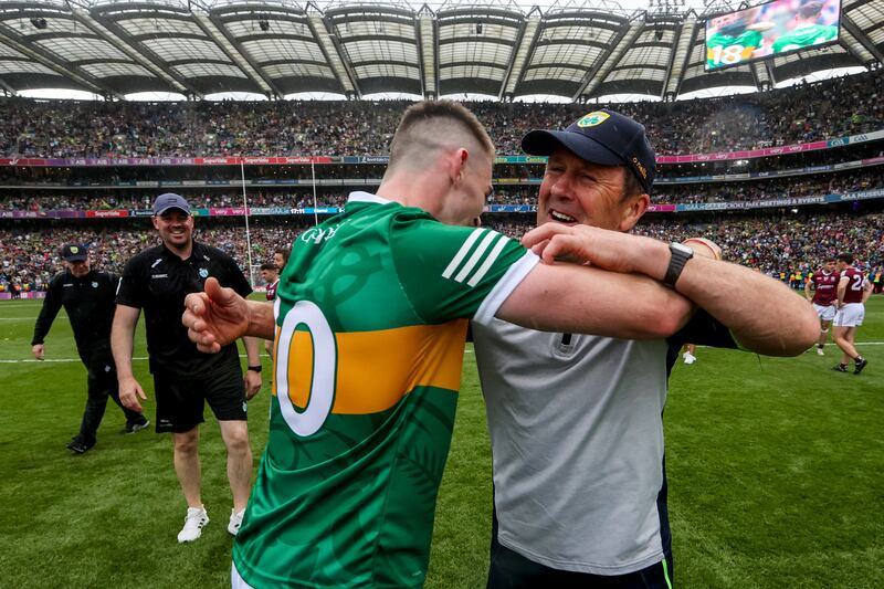 Kerry's Diarmuid O'Connor celebrates after the game with manager Jack O’Connor. Photograph: Ryan Byrne/Inpho