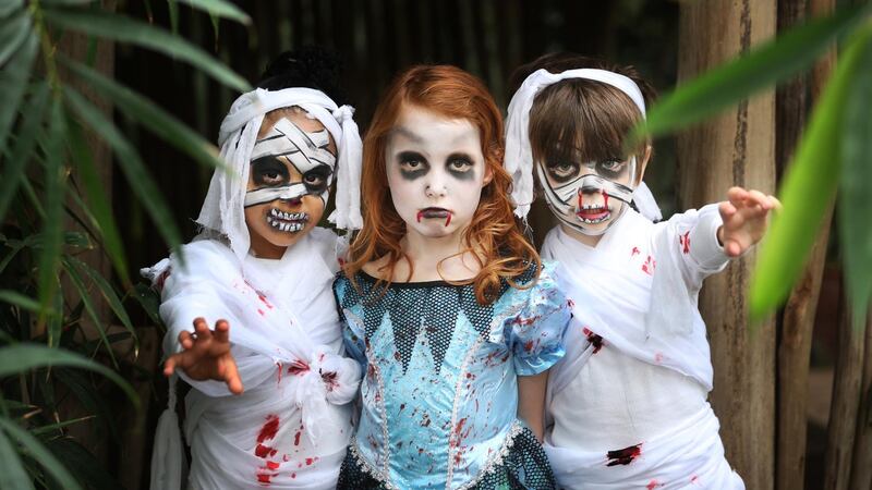 Joy O’Brien Awesu (age 6 from Tallaght), Molly White (age 6 from Phibsborough) and Eric Moore (age 6 from Rialto) in the National Botanic Gardens Glasnevin at the the launch of the Bram Stoker Festival. Photograph: Sasko Lazarov/Photocall Ireland
