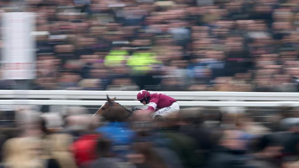 Don Poli ridden by Bryan Cooper races clear to win the RSA Chase. Photograph:  David Davies/PA Wire.