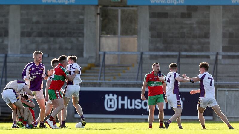 Tempers flare towards the end of the semi-final between Ballymun and Kilmacud. Photograph: Laszlo Geczo/Inpho