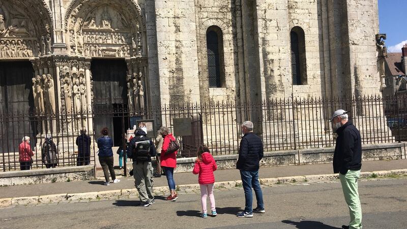 Visitors queue at the reopened Notre Dame de Chartres cathedral on May 14th. Only 10 people were allowed in the cathedral at any one time. Photograph: Tala Skari