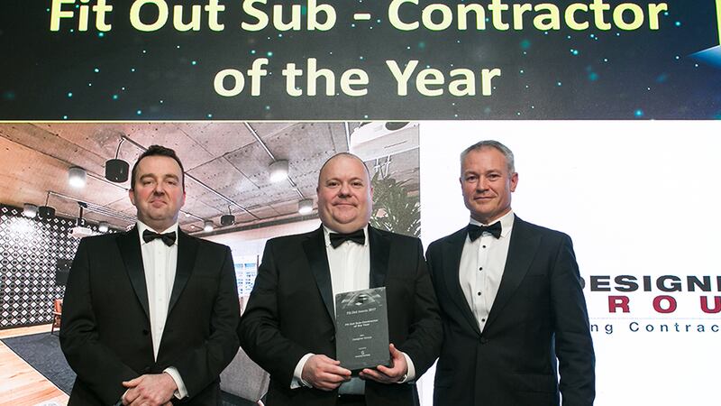 Niall Rock, Managing Director, Storage Systems presents the Fit Out Sub-Contractor of the Year award to Niall Stone & Niall Treacy, Designer Group