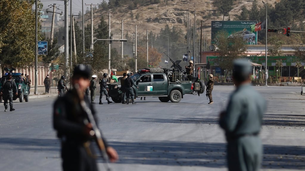 Afghan security officials take positions near the scene of an attack by armed men on Shamshad TV station in Kabul, Afghanistan. Photograph: Jawad Jalali/EPA