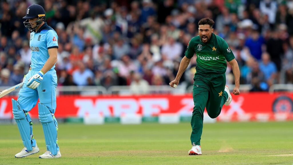 Pakistan’s Mohammad Amir celebrates taking the wicket of England’s Jos Buttler. Photograph: Simon Cooper/PA