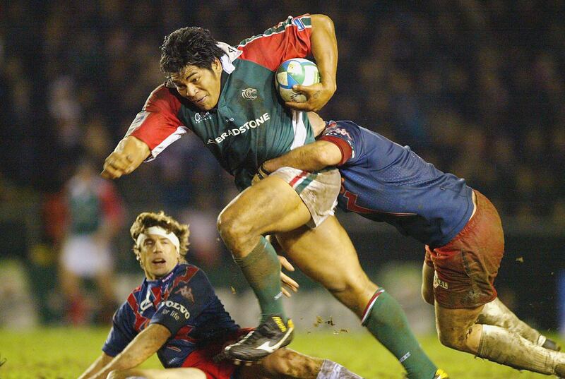 Leicester Tigers's Henry Tuilagi breaks through the Stade Francais defence during their Heineken Cup match in 2004. Photograph: Clive Mason/Getty Images