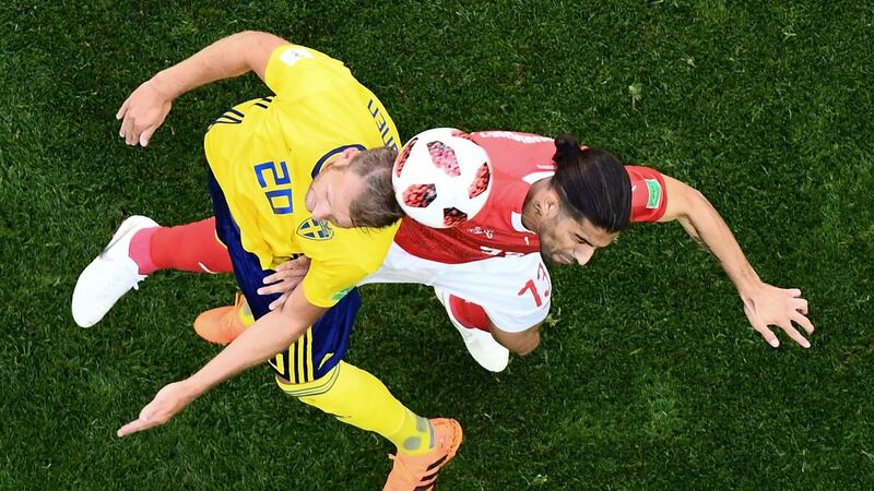 Sweden’s  Ola Toivonen  vies with Switzerland’s  Ricardo Rodriguez during  the World Cup Round of 16 match at Saint Petersburg Stadium. Photograph: Jewel Samad/AFP/Getty Images
