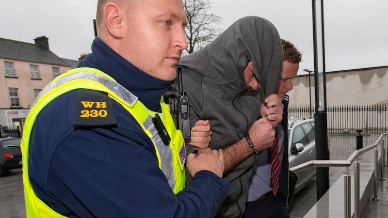 John Joyce (centre, wearing grey hoodie)pictured arriving at Mullingar District Court. Photograph: Colin Keegan, Collins Dublin