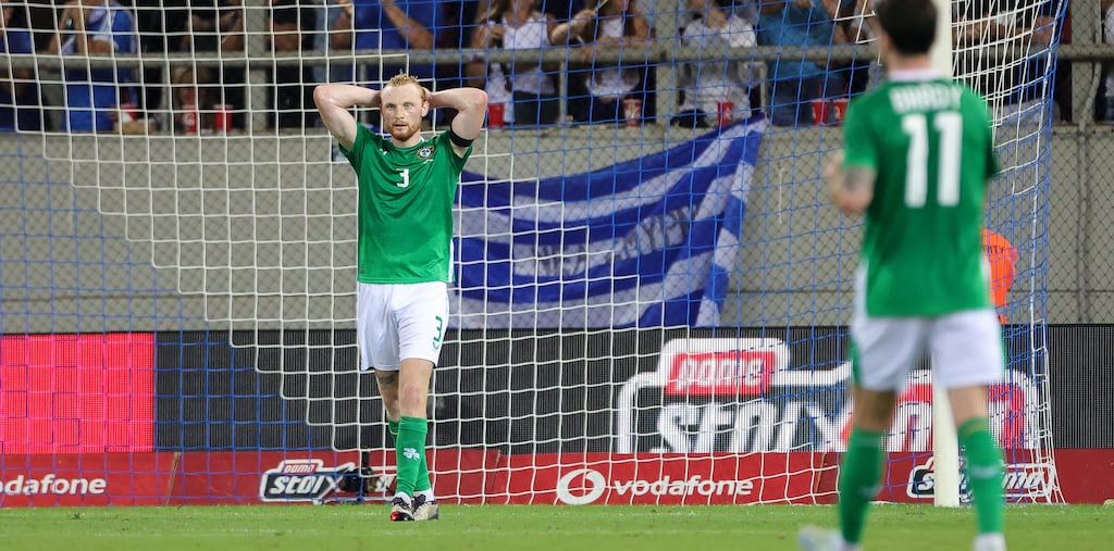 Ireland’s Liam Scales appears dejected after his side conceded the second goal in Athens. Photograph: Nikola Krstic/Inpho