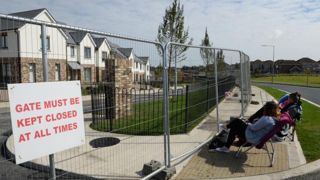People gather to queue outside the Millers Glen new housing development in Swords, earlier this month. Minister for Finance Michael Noonan has confirmed that the Revenue Commissioners is reviewing its property tax guidelines to take account of escalating house values in Dublin. Photograph: Dara Mac Dónaill / The Irish Times