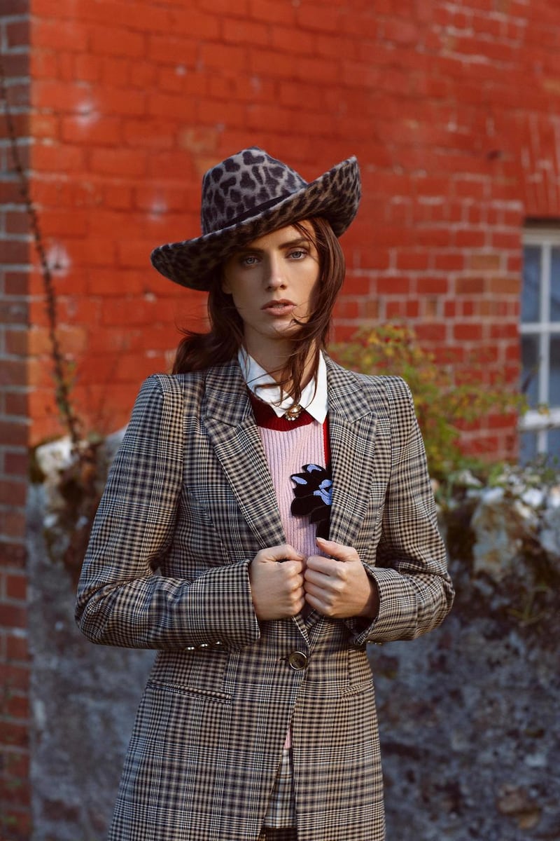 Check jackets (€100 River Island), check top with collar (€43 River Island), jumper (€215 Max Co, Arnotts), leopard print cowboy hat (€180 Anthony Peto)