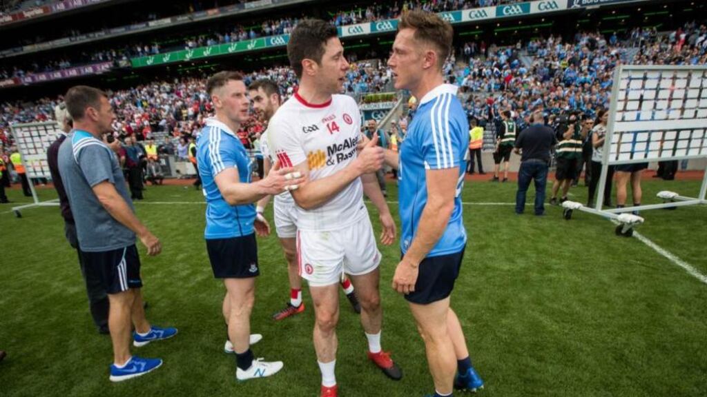 Seán Cavanagh with Dublin’s Paul Flynn: “All things being equal I think Dublin are going to dominate for a while to come.” Photograph: Ryan Byrne/Inpho