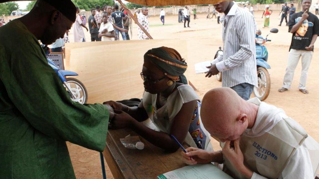 A man gets his finger marked with ink during Mali’s presidential election in Lafiabougou in Bamako. Photograph: Adama Diarra/Reuters