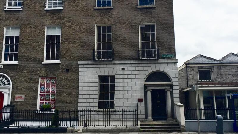 63 Lower Leeson Street, Dublin 2: Georgian office building with top-floor apartment.