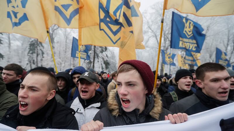 Ukrainian nationalists rally in front of the parliament building in Kiev, Ukraine, demanding diplomatic relations with Russia be severed and Russian property in Ukraine be nationalised. Photograph: Sergey Dolzhenko/EPA