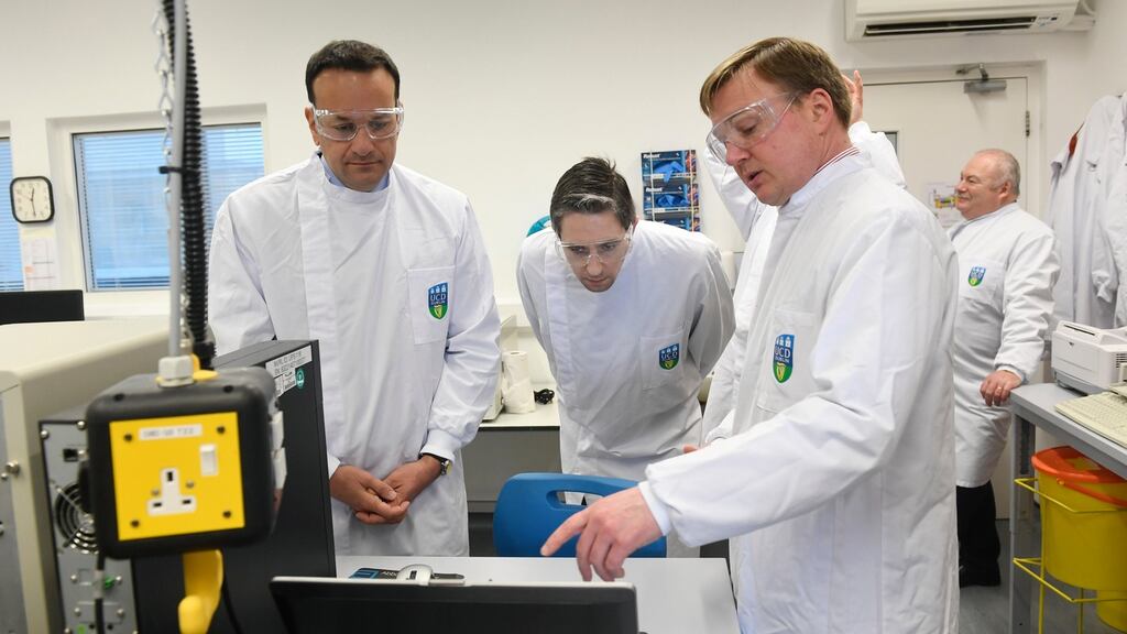 Dr Cillian De Gascun (right), director of the National Virus Reference Laboratory,  with Taoiseach  Leo Varadkar and  Minister for Health Simon Harris at the laboratory in  UCD.  Photograph: Aidan Crawley/EPA