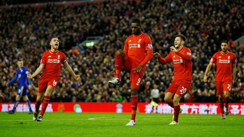 Christian Benteke celebrates scoring the first goal for Liverpool Photograph: Phil Noble/Reuters
