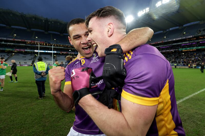 Kilmacud Crokes' Shane Walsh celebrates after the game with Craig Dias. Photograph: Laszlo Geczo/Inpho