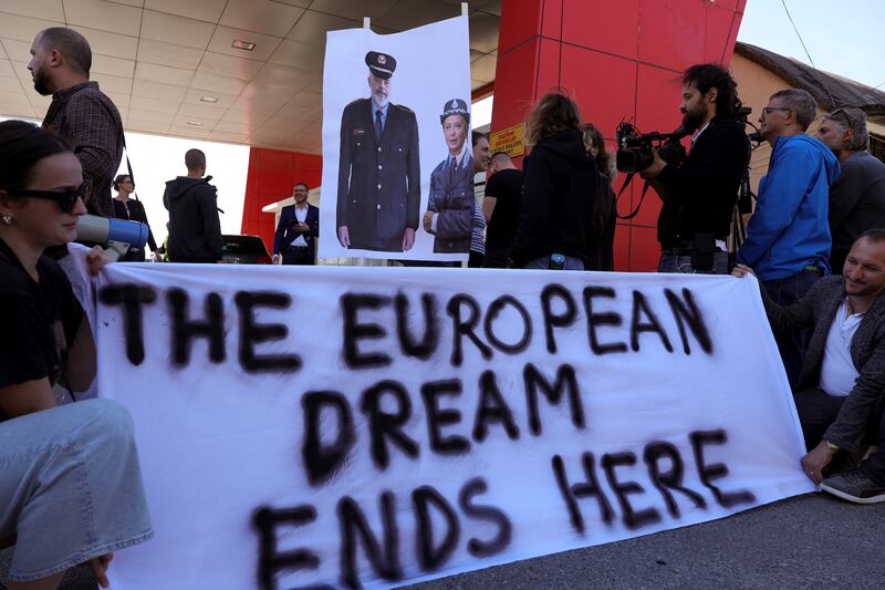 Civil rights activists protest after the first group migrants intercepted in Italian waters arrived at Shengjin port in Albania last October. Edi Rama signed a deal with Italian prime minister Giorgia Meloni allowing facilities to be set up in Albania where Italy could detain asylum seekers while their claims are processed. Photograph: Adnan Beci/AFP