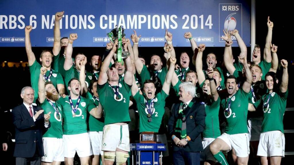 The Ireland team celebrate after collecting the Six Nations Championship title at Stade de France, Paris. Photograph: Dan Sheridan/Inpho