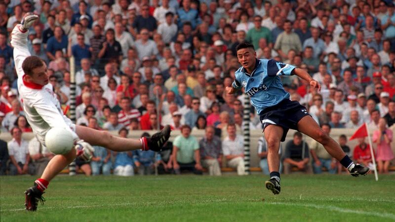 Jason Sherlock blasts the ball past Cork goalkeeper Kevin O’Dwyer for his side’s goal in the 1995 All-Ireland football semi-final victory over Cork. Photograph: David Maher/Inpho