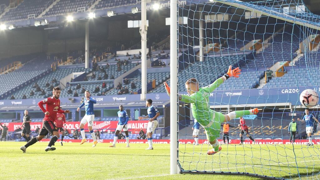 Bruno Fernandes of Manchester United scores his team’s first goal past Jordan Pickford of Everton during the Premier League match at Goodison Park. Photo: Carl Recine - Pool/Getty Images