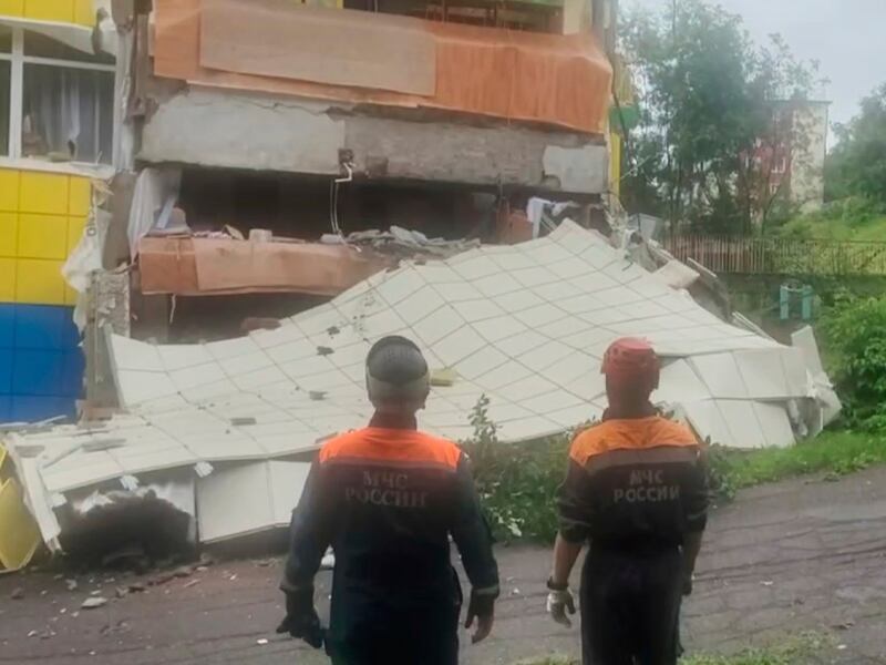 Rescuers inspect a kindergarten damaged by an earthquake in Petropavlovsk-Kamchatsky, Russia. Photograph: Russian Emergency Ministry Press Service/AP