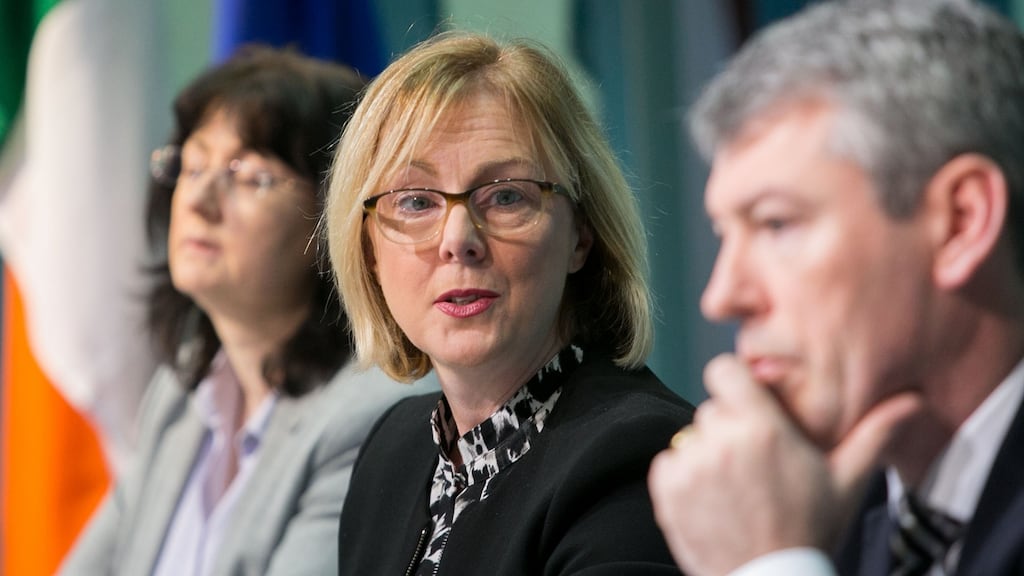 Minister for Employment Affairs & Social Protection Regina Doherty, centre, with Helen McDonald, principal, and Jim Duggan, assistant secretary of the department, in Government Buildings. Photograph: Gareth Chaney/Collins