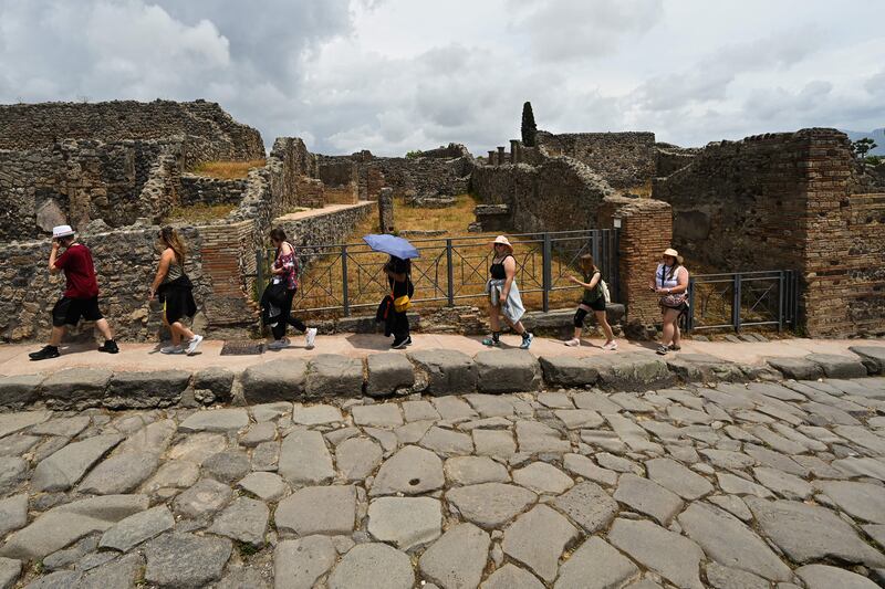 Visitors tour the Archaeological Park of Pompeii, near Naples. Photograph: Andreas Solaro/AFP via Getty Images