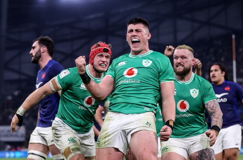 Dan Sheehan celebrates scoring Ireland's fourth try with Josh van der Flier and Andrew Porter during the Six Nations match against France at Stade Vélodrome. Photograph: Dan Sheridan/Inpho