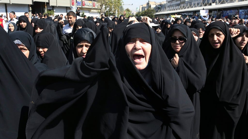 Iranian women chant slogans at an anti-Saudi protest rally: they were among thousands of worshippers have marched in Tehran after Friday prayers to denounce the “incompetency” of Saudi Arabia’s handling the hajj. Photograph: Vahid Salemi/AP