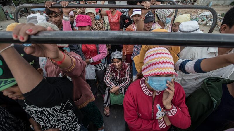 Workers cram together in trucks from the provinces to work in the many garment factories in Phnom Penh, Cambodia. File photograph: Jason South/Fairfax Media/Getty Images
