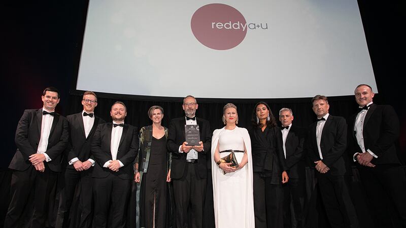 Noel McKernan, General Manager, HALT, presents the Architectural Practice of the Year award to the Reddy Architecture + Urbanism team.