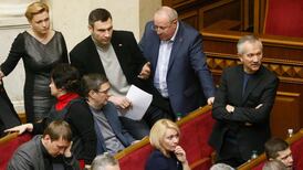 Ukraine’s protesters target president after PM resigns