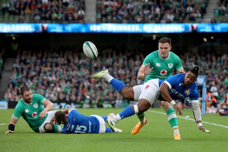 Italy's wing Paolo Odogwu (R) clears the ball during the pre-World Cup Rugby Union friendly match between Ireland and Italy at the Aviva. Photograph: Paul Faith/AFP via Getty