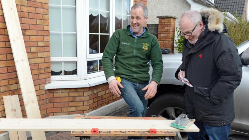 Labour Candidate Eoin Holmes (right), canvassing Godfrey Donoghue, at Rathoath, Co. Meath. Photograph: Eric Luke