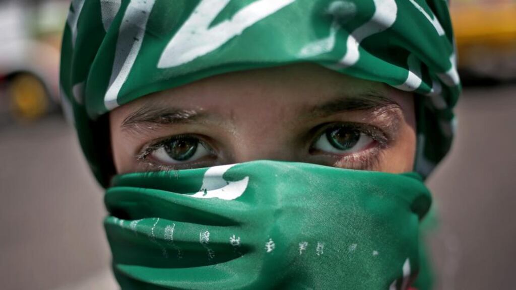 A Palestinian Hamas supporter attends a rally in Gaza City yesterday. Photograph: AP Photo/Khalil Hamra