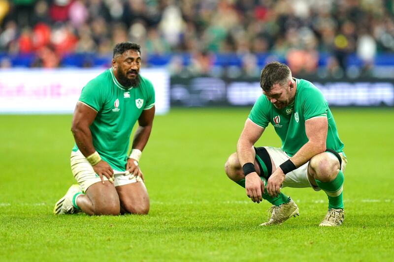 Bundee Aki and Peter O'Mahony dejected at full-time. Photograph: Gareth Fuller/PA Wire