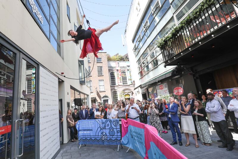 An aerial artist performs at the announcement of details, by Lord Mayor of Dublin Caroline Conroy and Minister for Arts Catherine Martin, of a €9m programme which will develop 60 artist workspaces in Dublin city