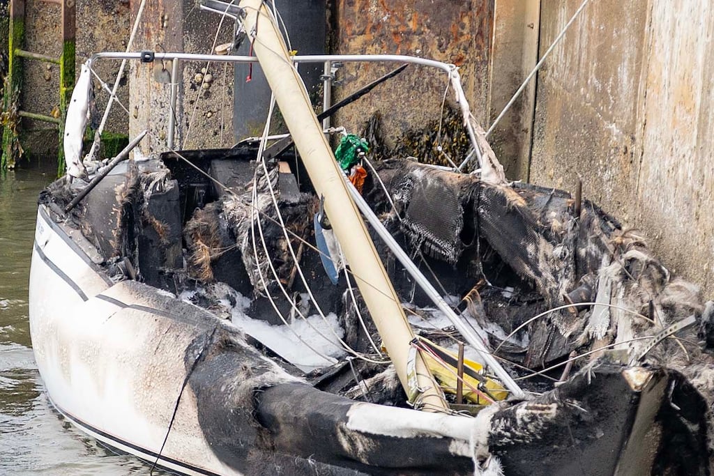The boat in Portballintrae harbour which was set alight and extensively damaged. Photograph: Steven McAuley/McAuley Multimedia