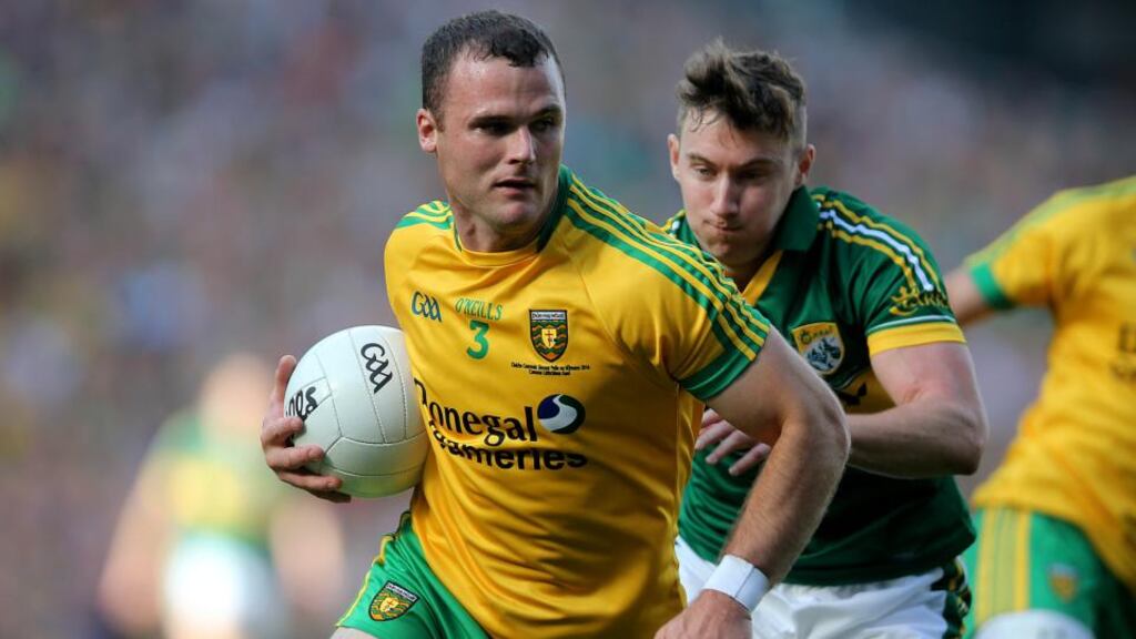 Neil McGee playing against James O’Donoghue in the All-Ireland final. Photograph: Donall Farmer/Inpho