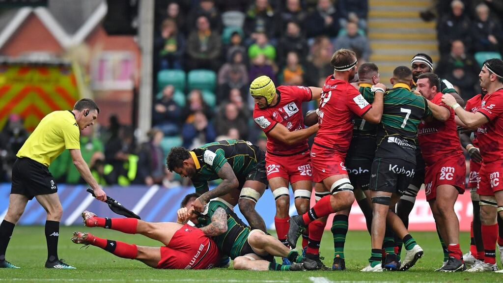 Players clash on the pitch late in the European Champions Cup clash between Northampton Saints and Lyon at Franklin’s Gardens in Northampton. Photograph Ben Stansall/AFP/Getty