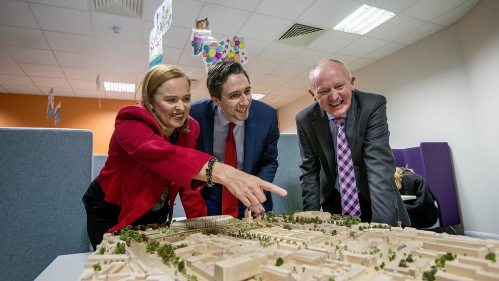 Minister for Health Simon Harris, centre, with Eilish Hardiman, group chief executive of the children’s hospital, and project director John Pollock. Photograph: Brenda Fitzsimons