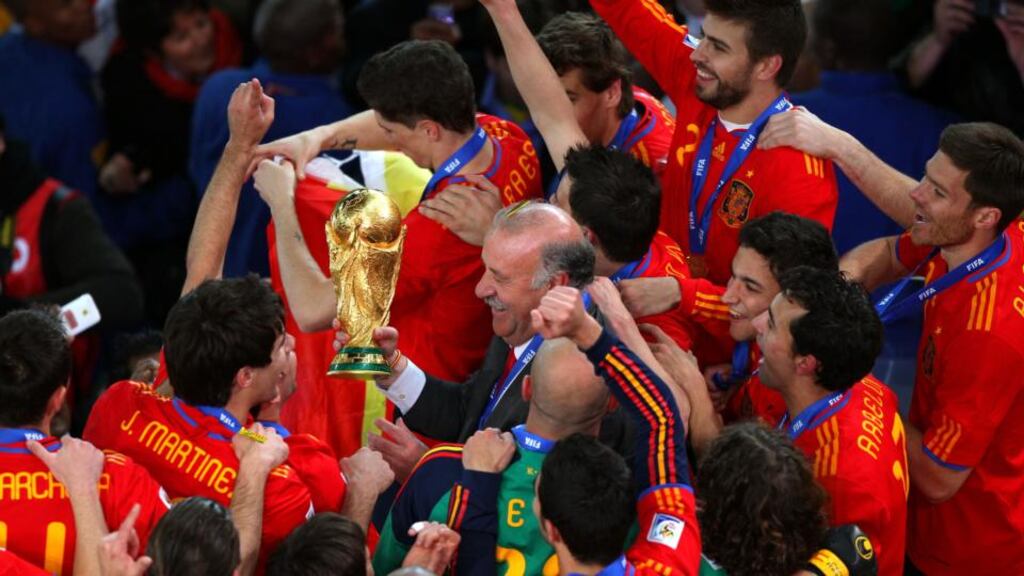 Vicente del Bosque celebrates as he lifts the World Cup with his team during the 2010 FIFA World Cup South Africa Final match between Netherlands and Spain at Soccer City Stadium on July 11th, 2010. Photograph: Michael Steele/Getty Images