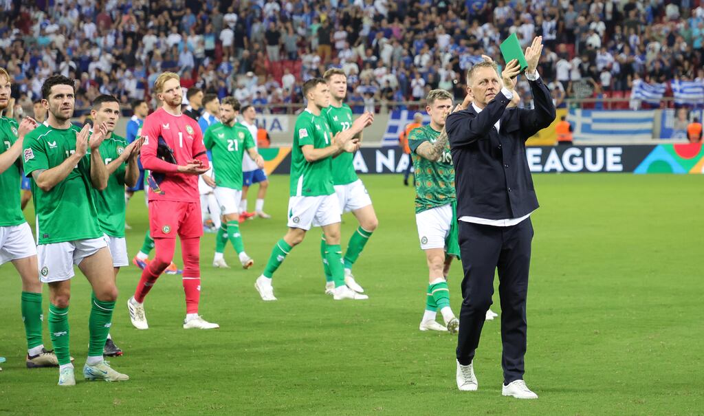 The Republic of Ireland team and manager Heimir Hallgrímsson applaud the fans after the loss to Greece. Photograph: Nikola Krstic/Inpho