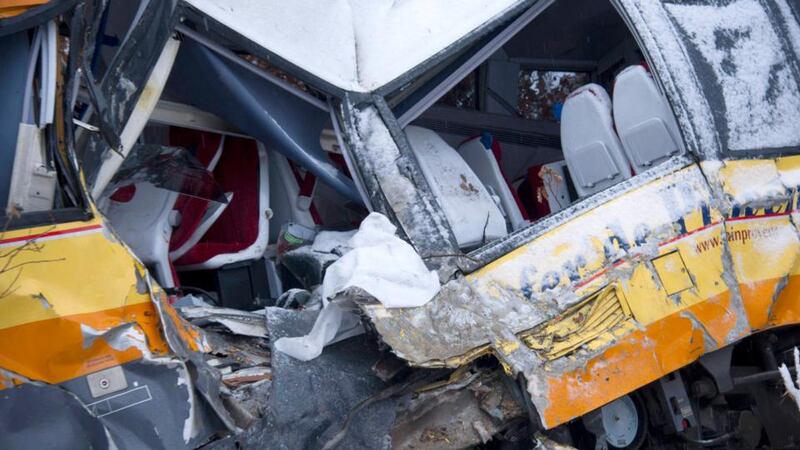 The derailed tourist train in the French Alps which was struck by a huge falling rock that killed two and injured at least nine. Photograph; Reuters