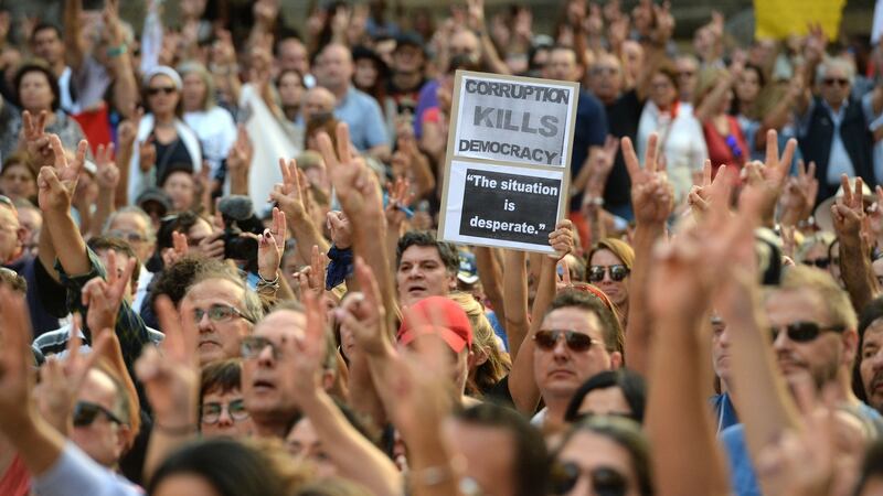 Thousands gather in Malta’s capital Valletta for a national rally to demand justice for murdered Maltese journalist Daphne Caruana Galizia. Photograph: Getty Images