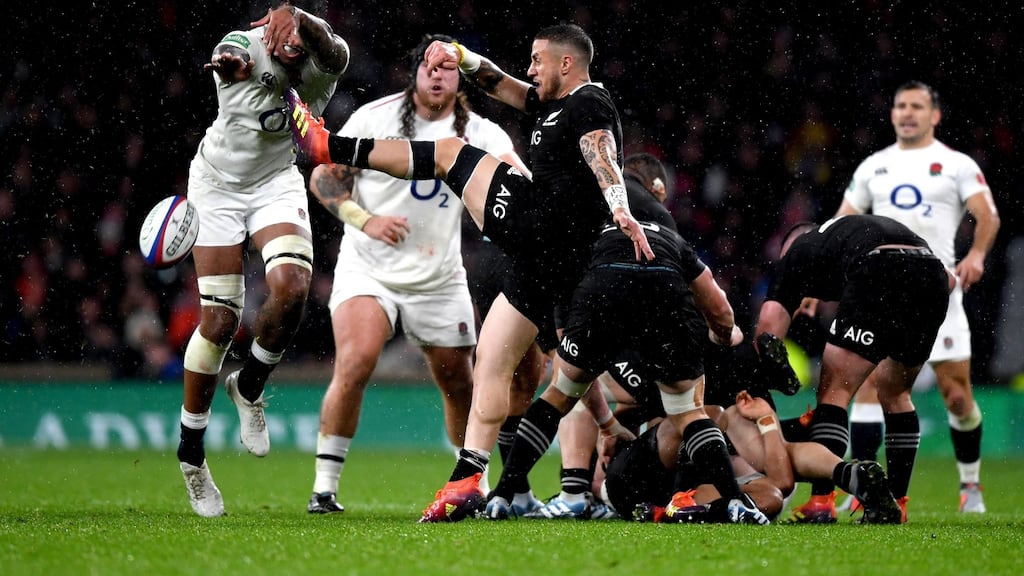 England’s Courtney Lawes charges the ball down from TJ Perenara of New Zealand at Twickenham Stadium on Saturday in London, United Kingdom. Photograph: Shaun Botterill/Getty Images