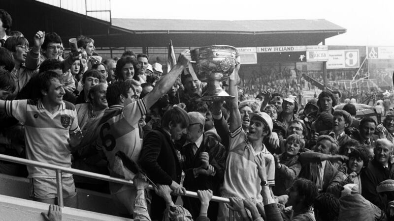Offaly players Sean Lowry and Mick Lowry lift the Sam Maguire after ending Kerry’s quest for a five in a row of All-Irelands in 1982. Photograph: Billy Stickland/Inpho