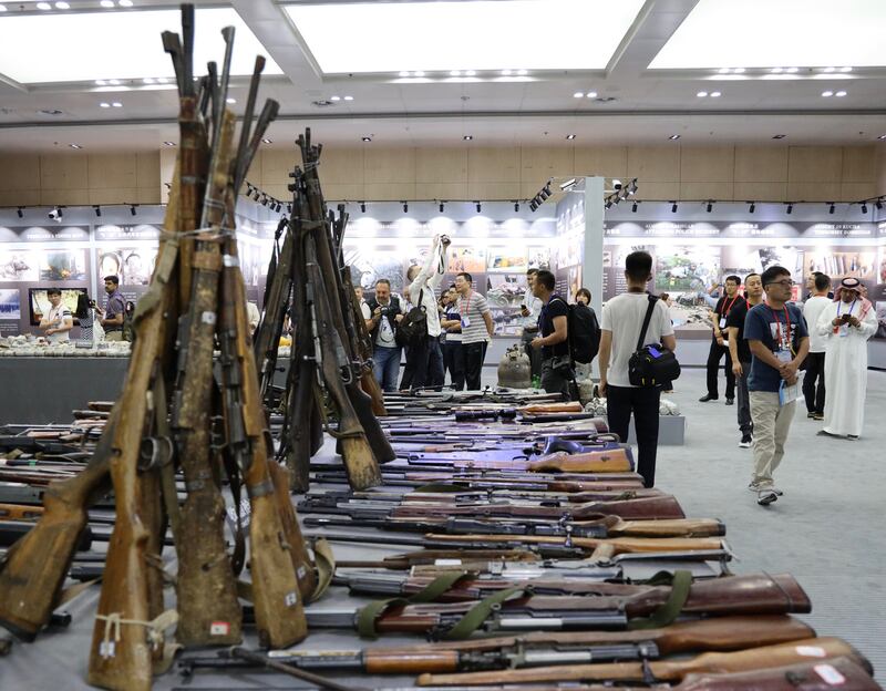 A display of seized arms at an exhibition about recent terror attacks in Xinjiang. Photograph: Peter Goff