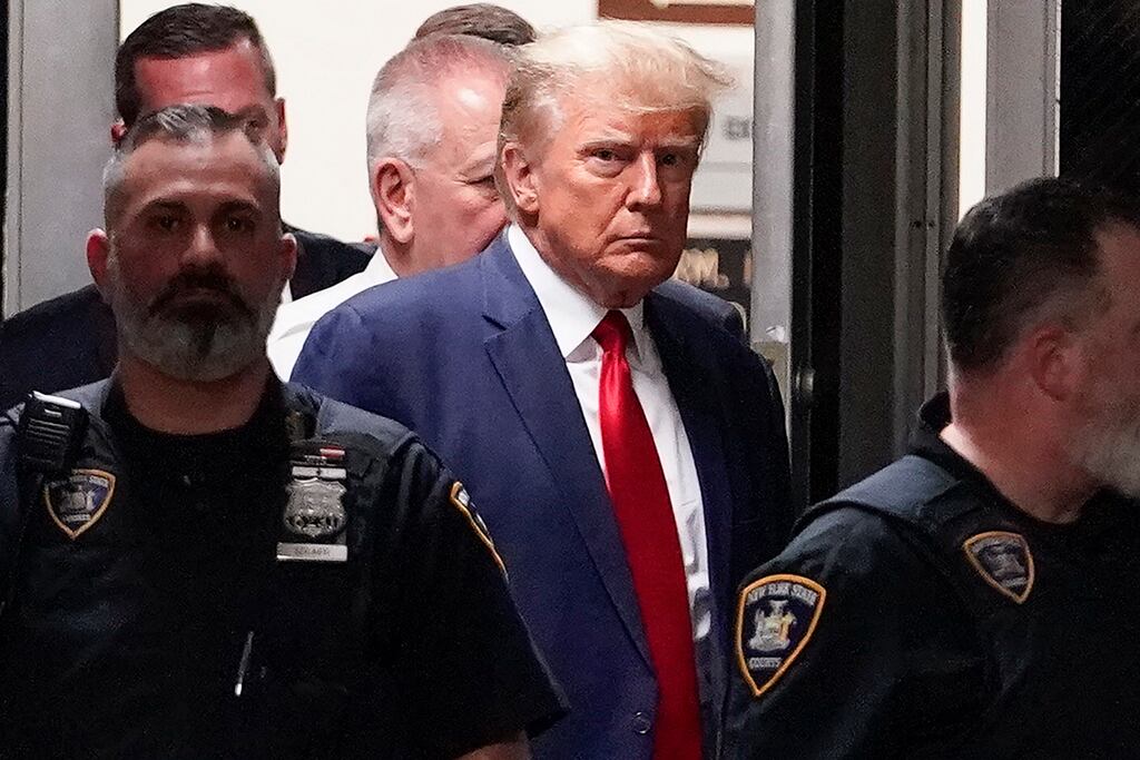 Former US president Donald Trump is escorted to a courtroom in New York in April. Photograph: Mary Altaffer/AP